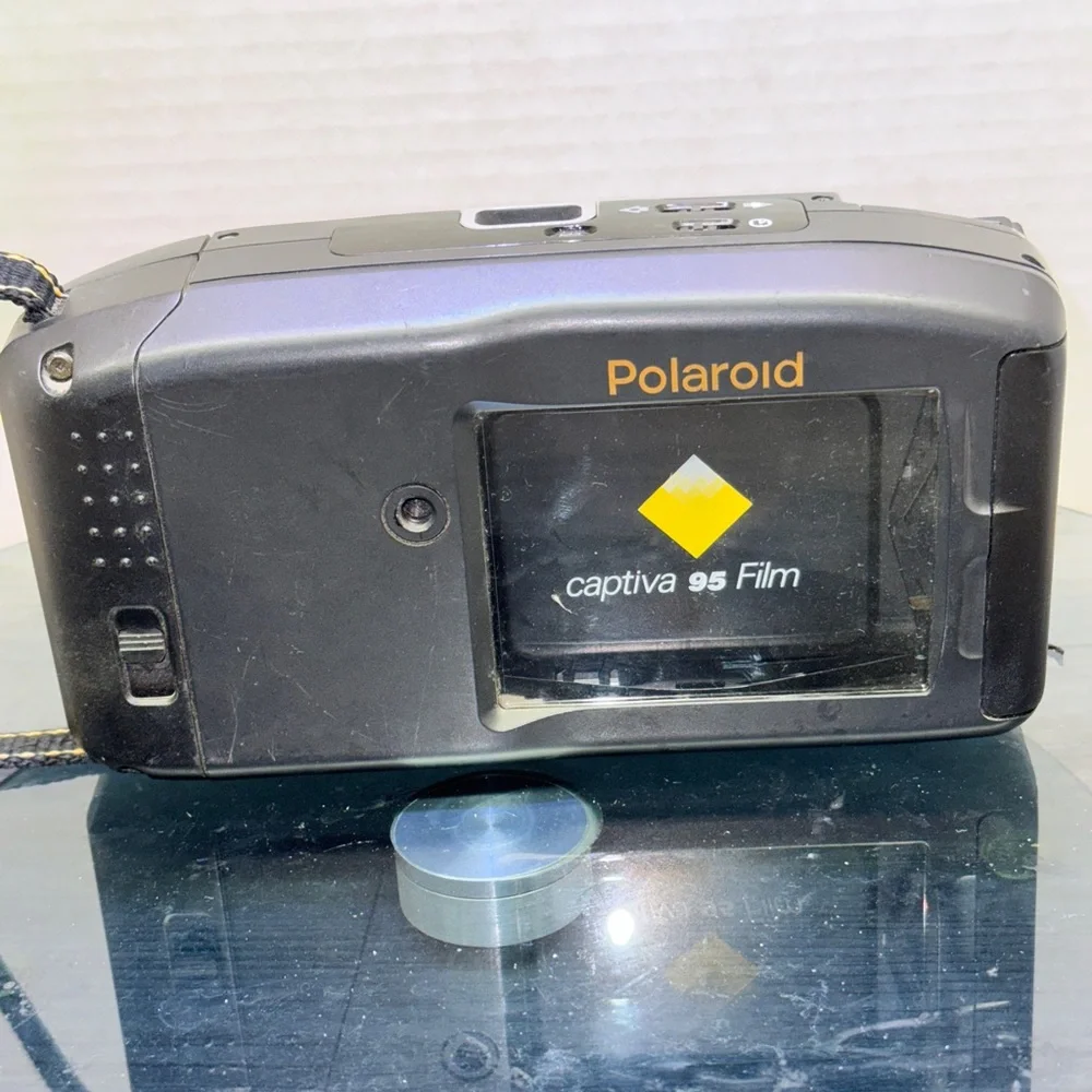Vintage Polaroid Captiva SLR SE Instant 95 Film Camera Auto Focus Black